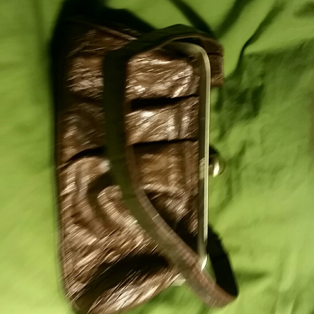 Bronze vinyl clutch bag great for going out